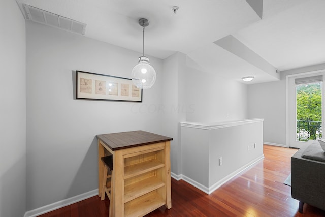 hallway featuring hardwood / wood-style floors