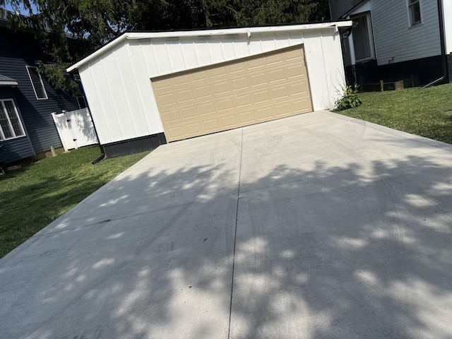 garage with a yard