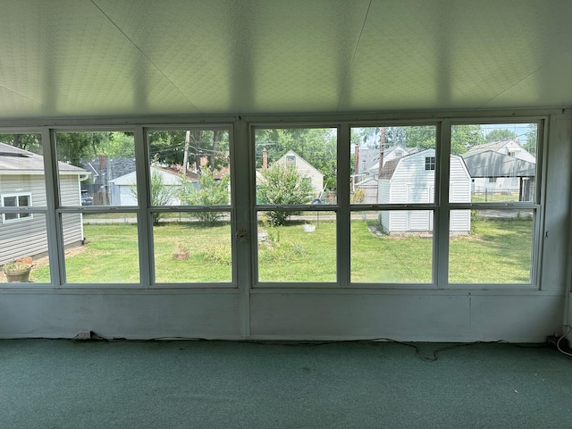 unfurnished sunroom featuring a healthy amount of sunlight