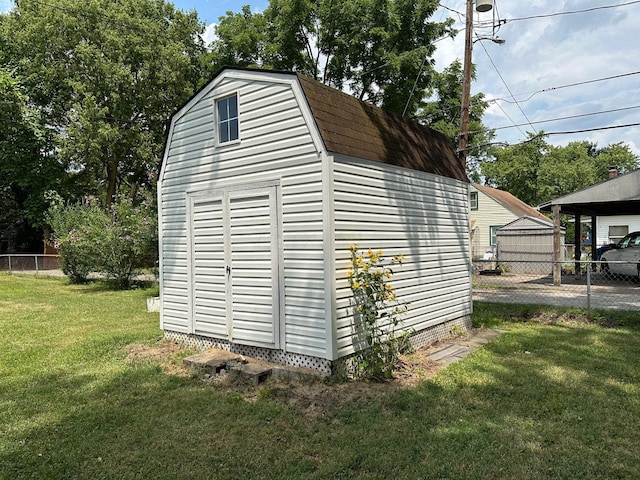 view of outdoor structure with a yard