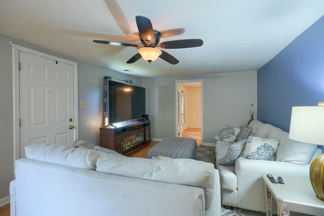 living room with ceiling fan