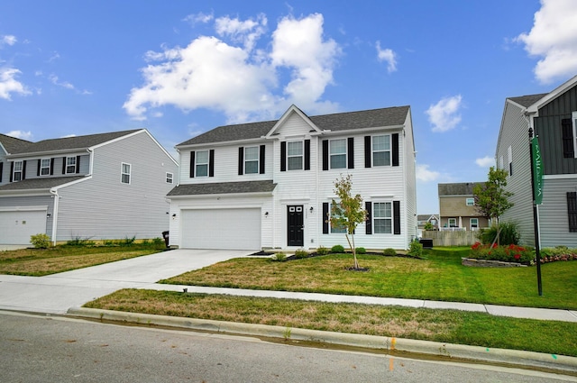 view of front facade featuring a garage and a front lawn