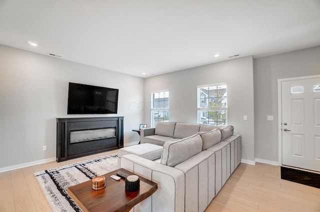 living room featuring light hardwood / wood-style floors