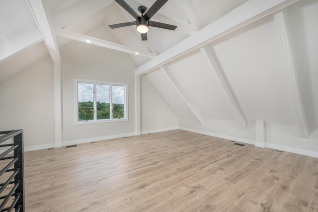 bonus room with ceiling fan, lofted ceiling with beams, and light wood-type flooring