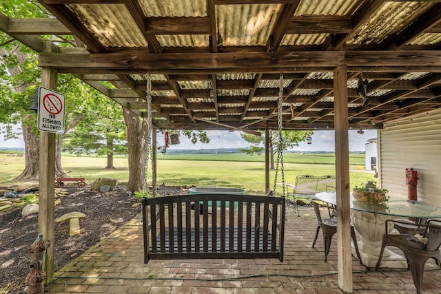 view of patio / terrace with a rural view