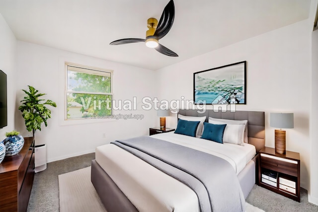 carpeted bedroom featuring ceiling fan