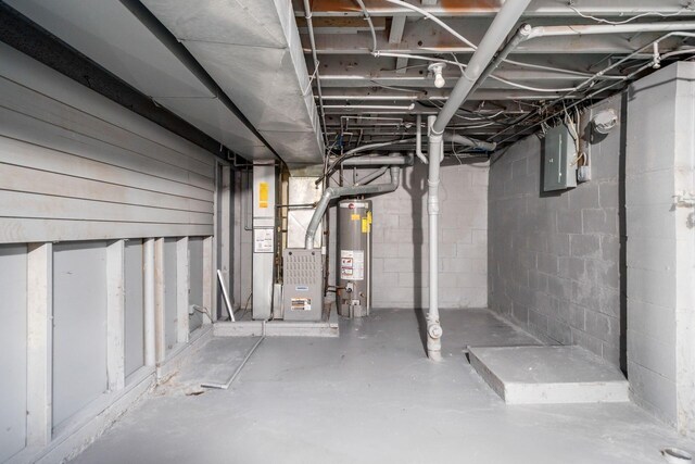 1288 Oakfield Dr N, Columbus, OH 43229 - unfinished basement with gas water heater, electric panel, and heating unit