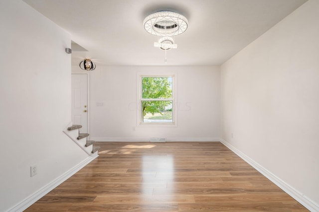 empty room featuring hardwood / wood-style floors