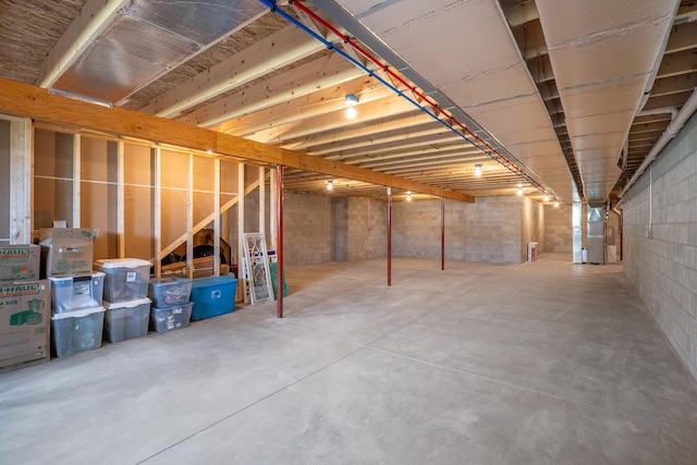 basement featuring heating unit