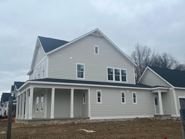 back of house with a porch