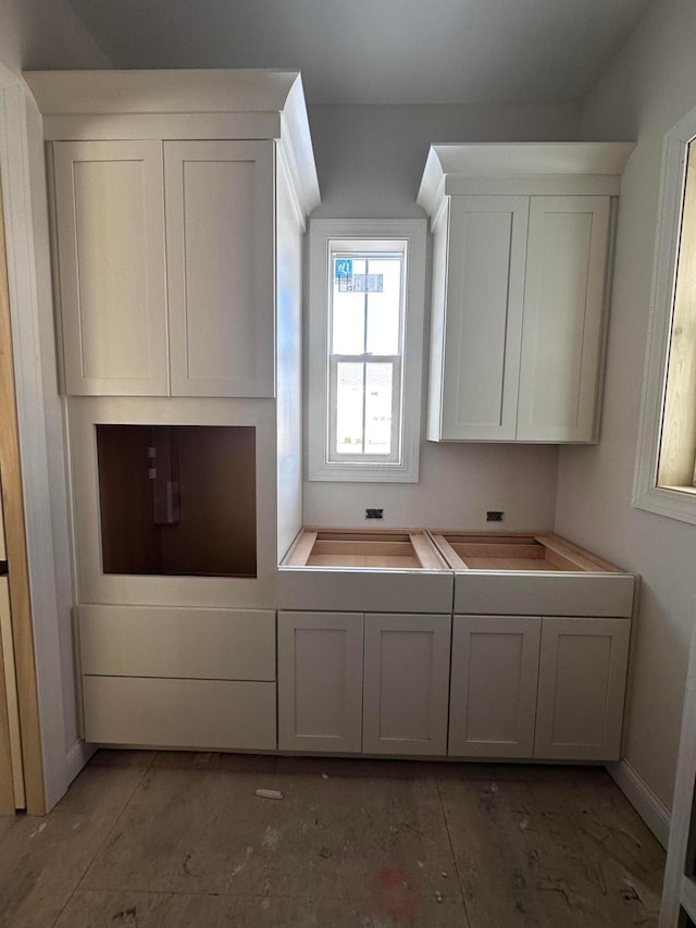 kitchen with white cabinetry