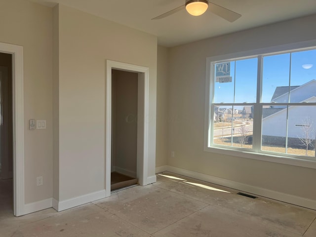 unfurnished bedroom featuring visible vents, ceiling fan, and baseboards