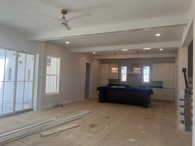 unfurnished living room with recessed lighting, beam ceiling, ceiling fan, and baseboards