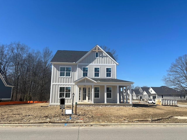 view of front of home with a porch and board and batten siding