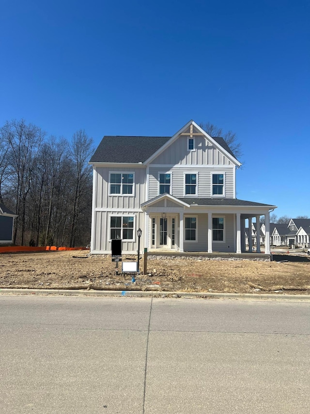 view of front of property featuring board and batten siding and a porch