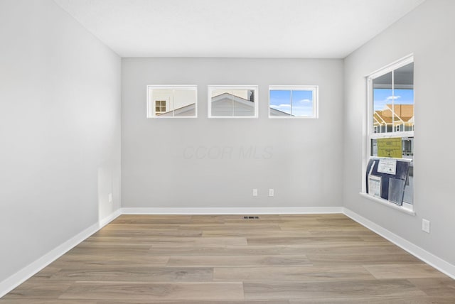 empty room featuring light wood-type flooring