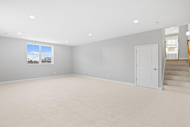 empty room with carpet flooring