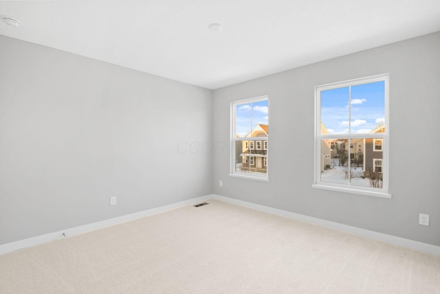 view of carpeted spare room