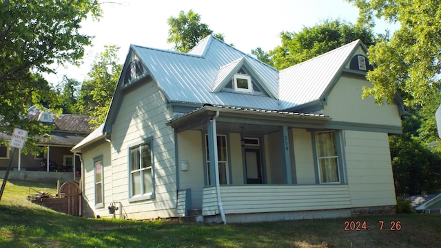 exterior space with a yard