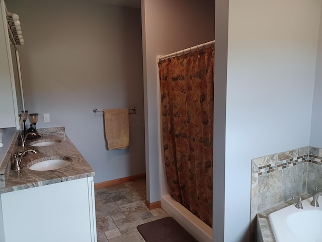 bathroom with vanity and curtained shower