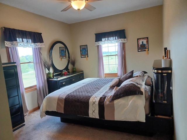 bedroom featuring carpet flooring and ceiling fan