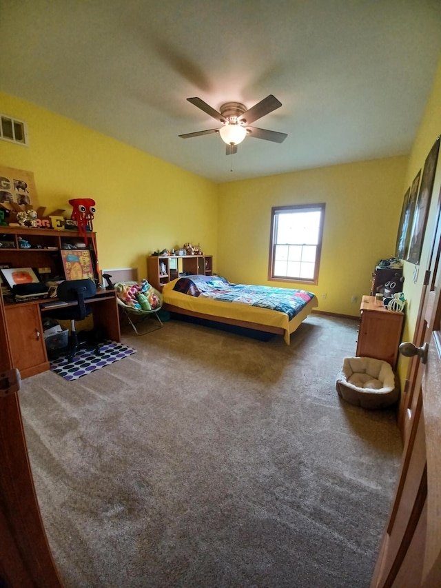 carpeted bedroom with ceiling fan