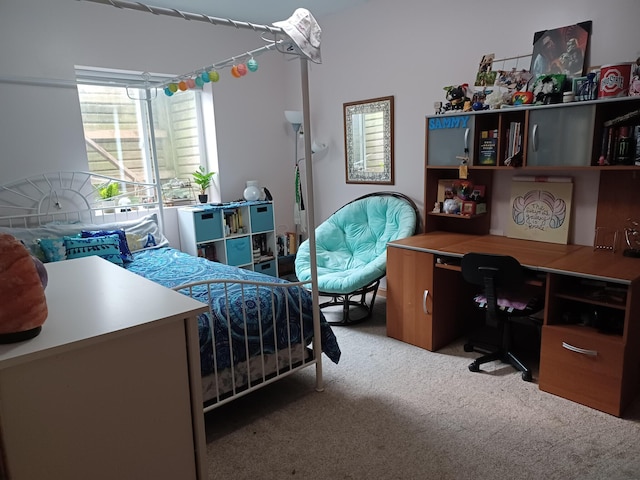 bedroom featuring light colored carpet