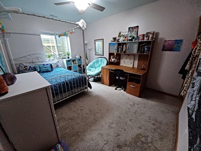 bedroom with ceiling fan and carpet