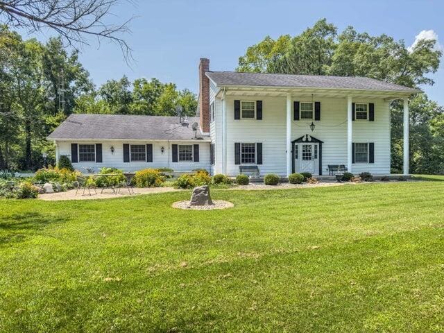 view of front of home with a front yard