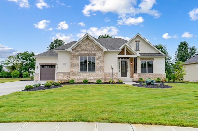 craftsman-style home with a garage and a front lawn