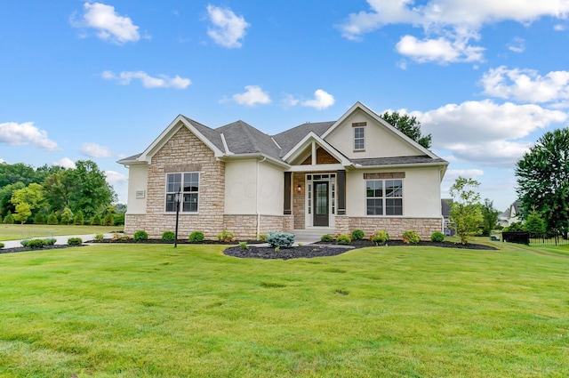 craftsman-style home featuring a front lawn