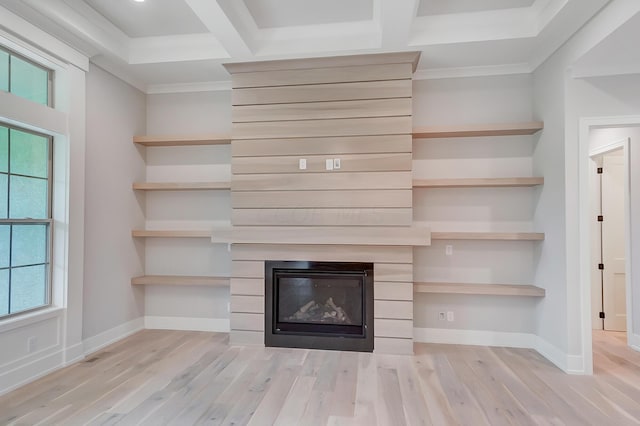 interior details featuring wood-type flooring, ornamental molding, and coffered ceiling