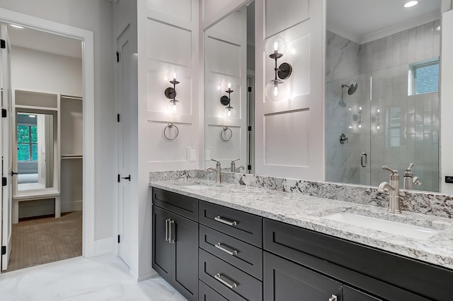 bathroom with vanity and an enclosed shower