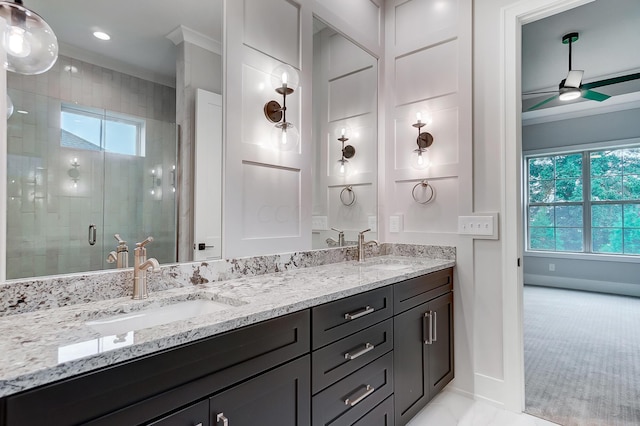 bathroom featuring walk in shower, vanity, plenty of natural light, and ceiling fan