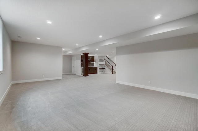 basement with light carpet