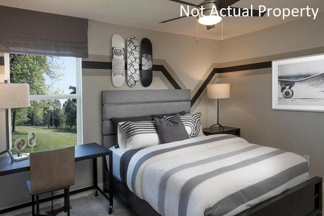 bedroom featuring carpet flooring and ceiling fan