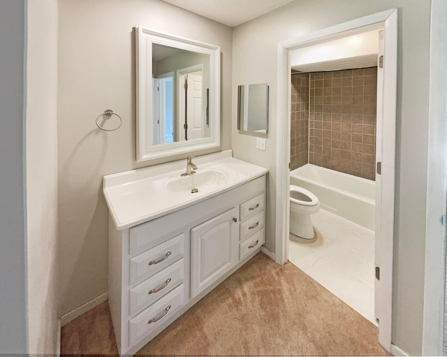 full bathroom with tile patterned flooring, vanity, toilet, and tiled shower / bath