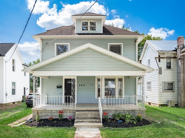 view of front of home featuring central AC unit