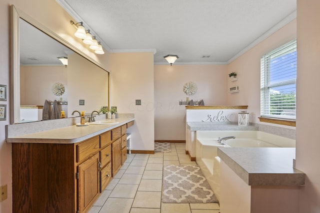 bathroom with a bathing tub, tile patterned flooring, crown molding, a textured ceiling, and vanity