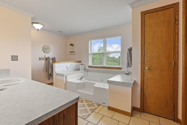 bathroom with tile patterned flooring, vanity, a bathtub, and ornamental molding