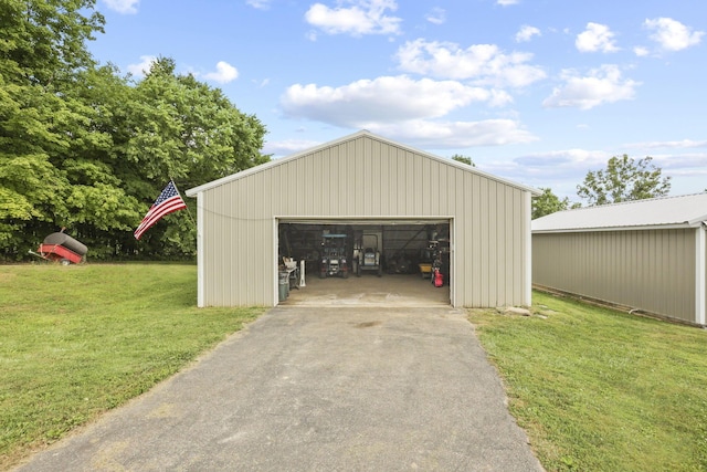 garage featuring a yard