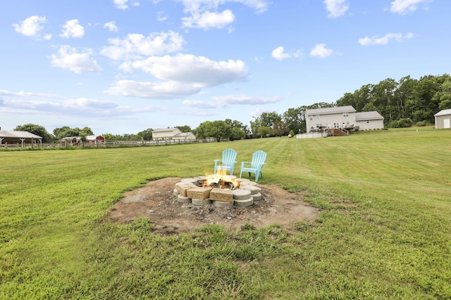 view of yard featuring a fire pit