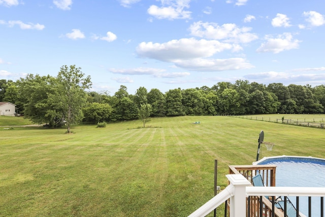 view of yard with a rural view