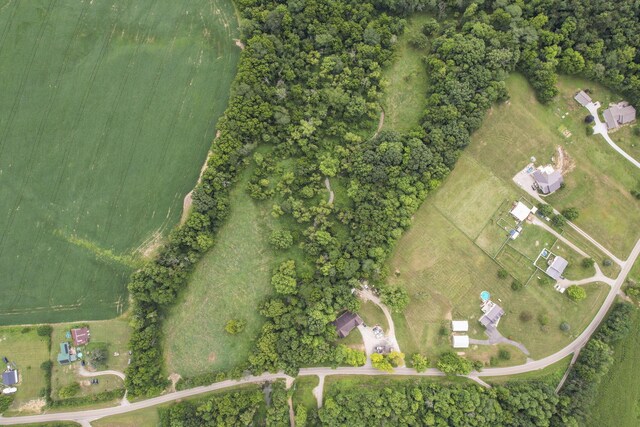 birds eye view of property with a rural view