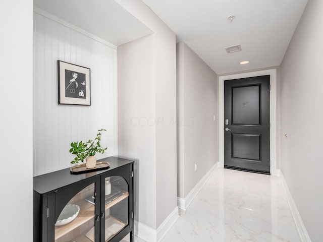50 W Broad St Unit 2905, Columbus, OH 43215 - hallway with light marble finish floors and baseboards
