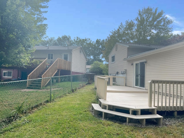 view of yard featuring a wooden deck