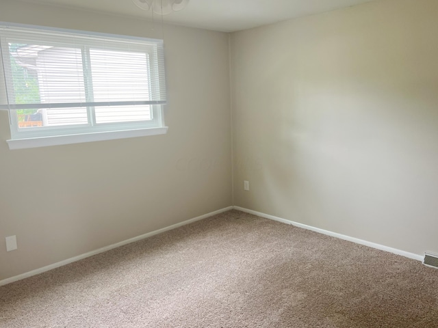 view of carpeted spare room