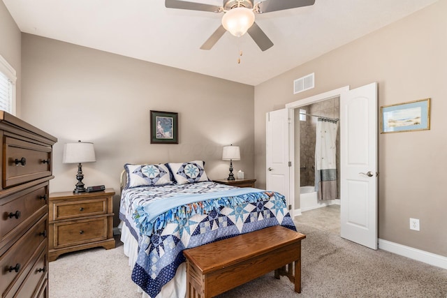 carpeted bedroom with ceiling fan and connected bathroom