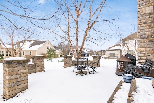 view of yard layered in snow