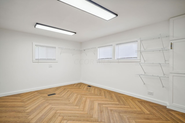 spare room featuring light parquet floors